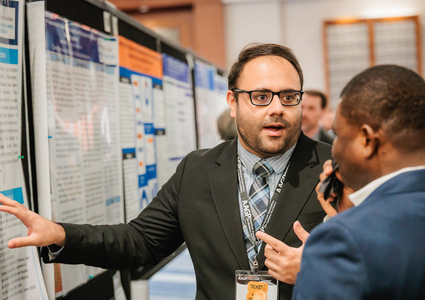 Two people connecting at the AAGP annual meeting